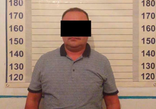 В Кара-Суу по подозрению в мошенничестве с земельным участком задержаны три человека