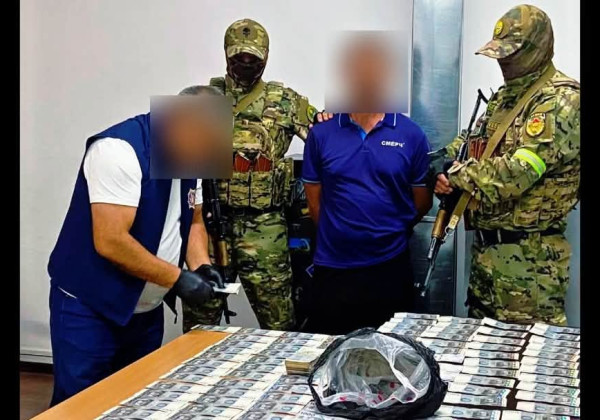 В Оше пресечена попытка передачи взятки в 650 тысяч сомов